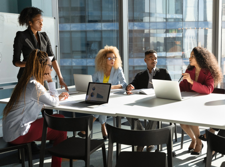 Young African American businesswoman lead meeting